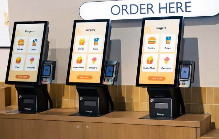 Barista operating POS terminal